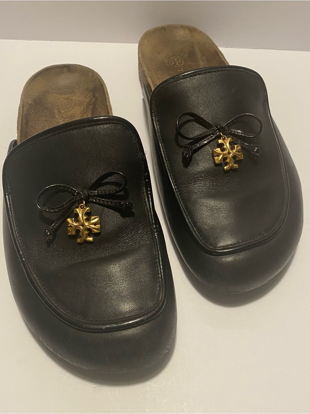 Tory Burch Black Leather Slip-On Mules with Gold Logo Charm